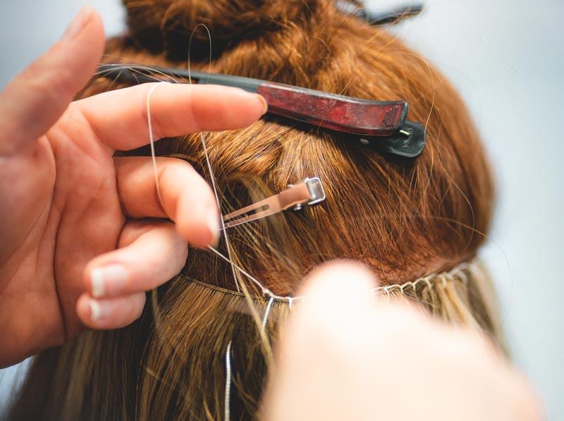Hand-tied Extensions in Salzburg bei Hairdesign Kaufmann